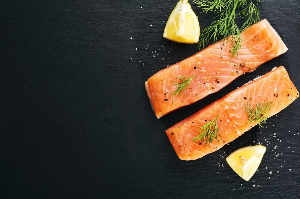 raw-salmon-fish-black-slate